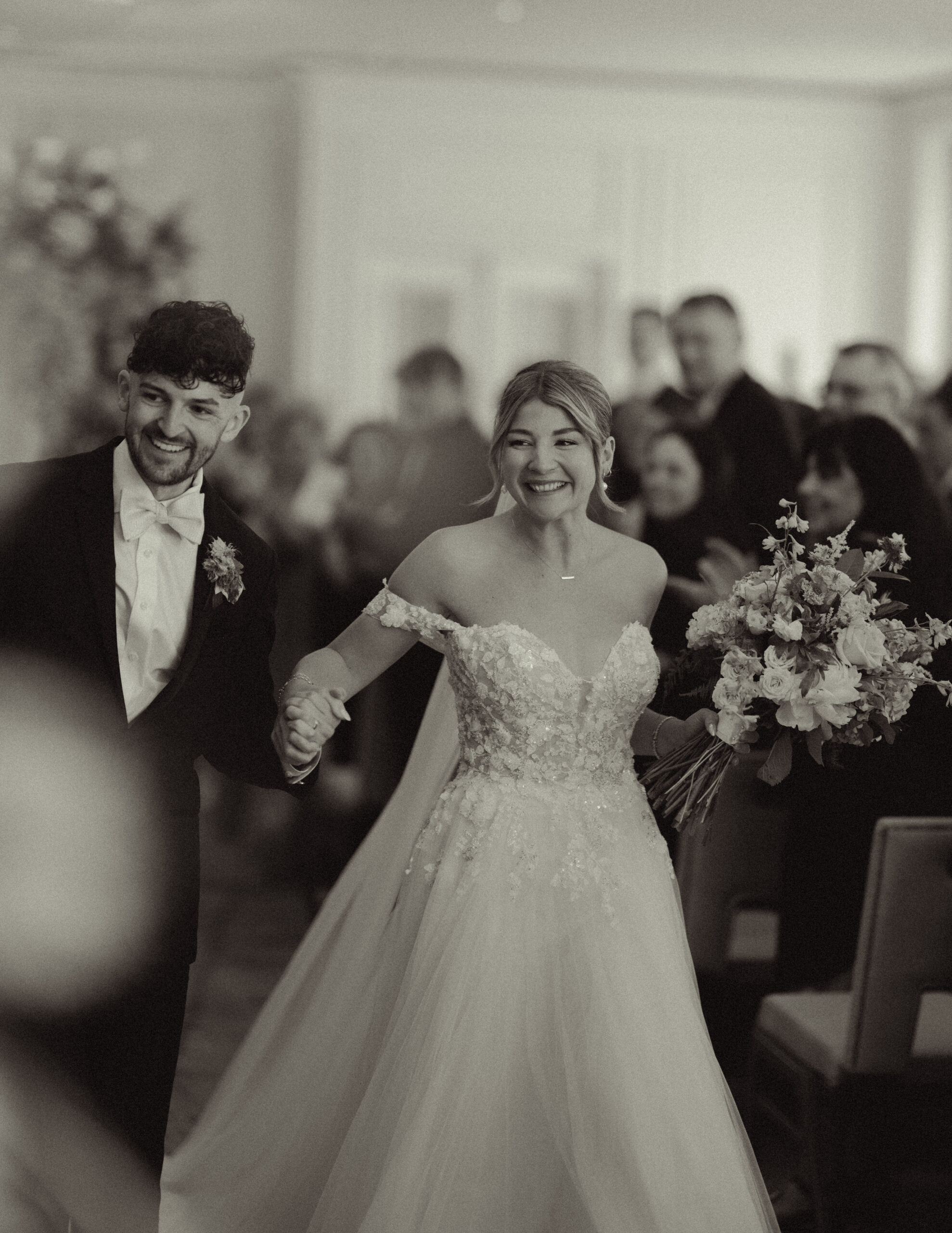 Emma & Kenny walking down the aisle after their 1st kiss as a married couple.